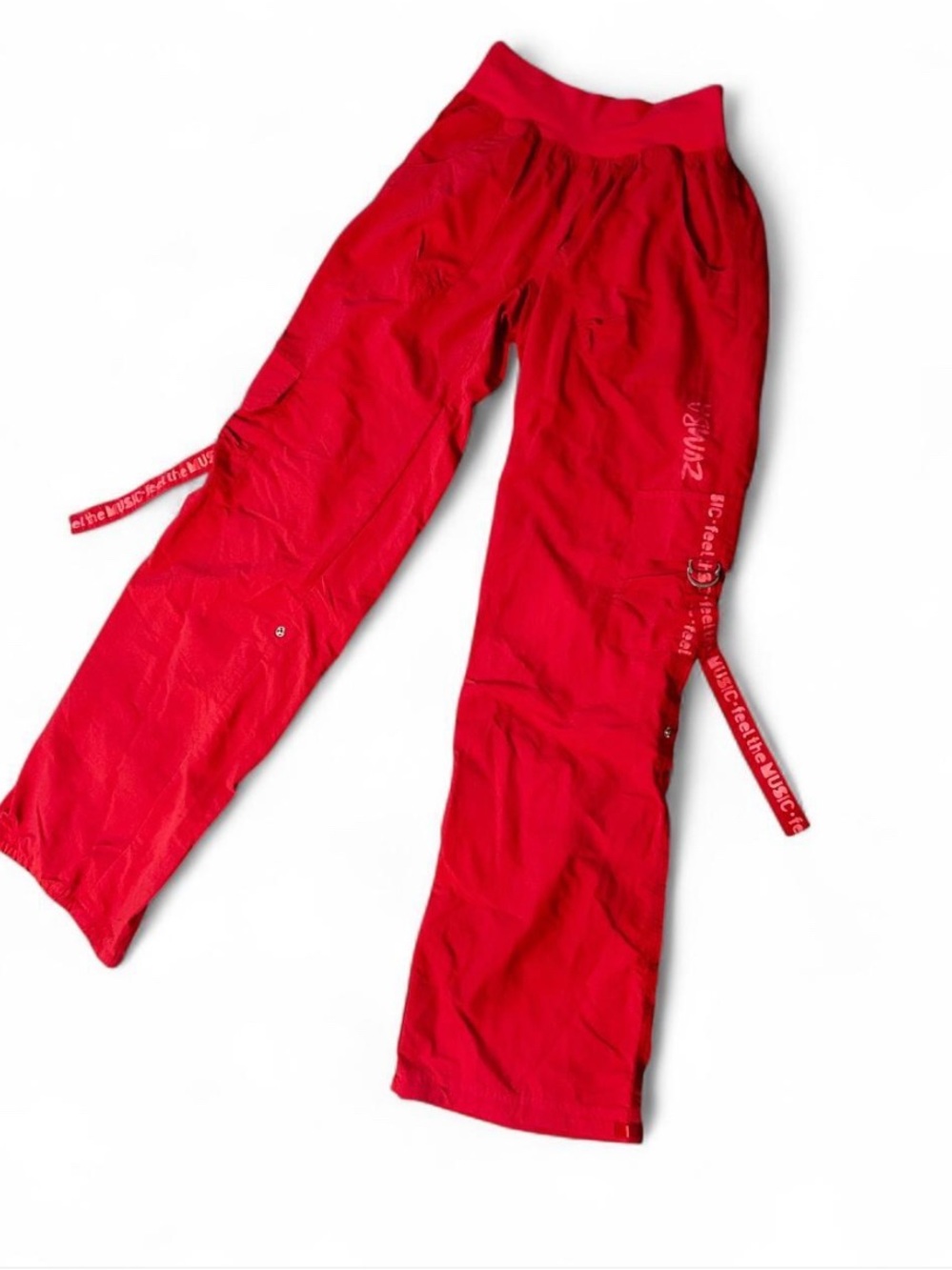 Hot pink Zumba wide leg cargo pants with white text on side pockets, size